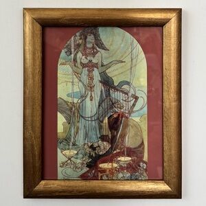 Art nouveau wall art in gilded wood frame.